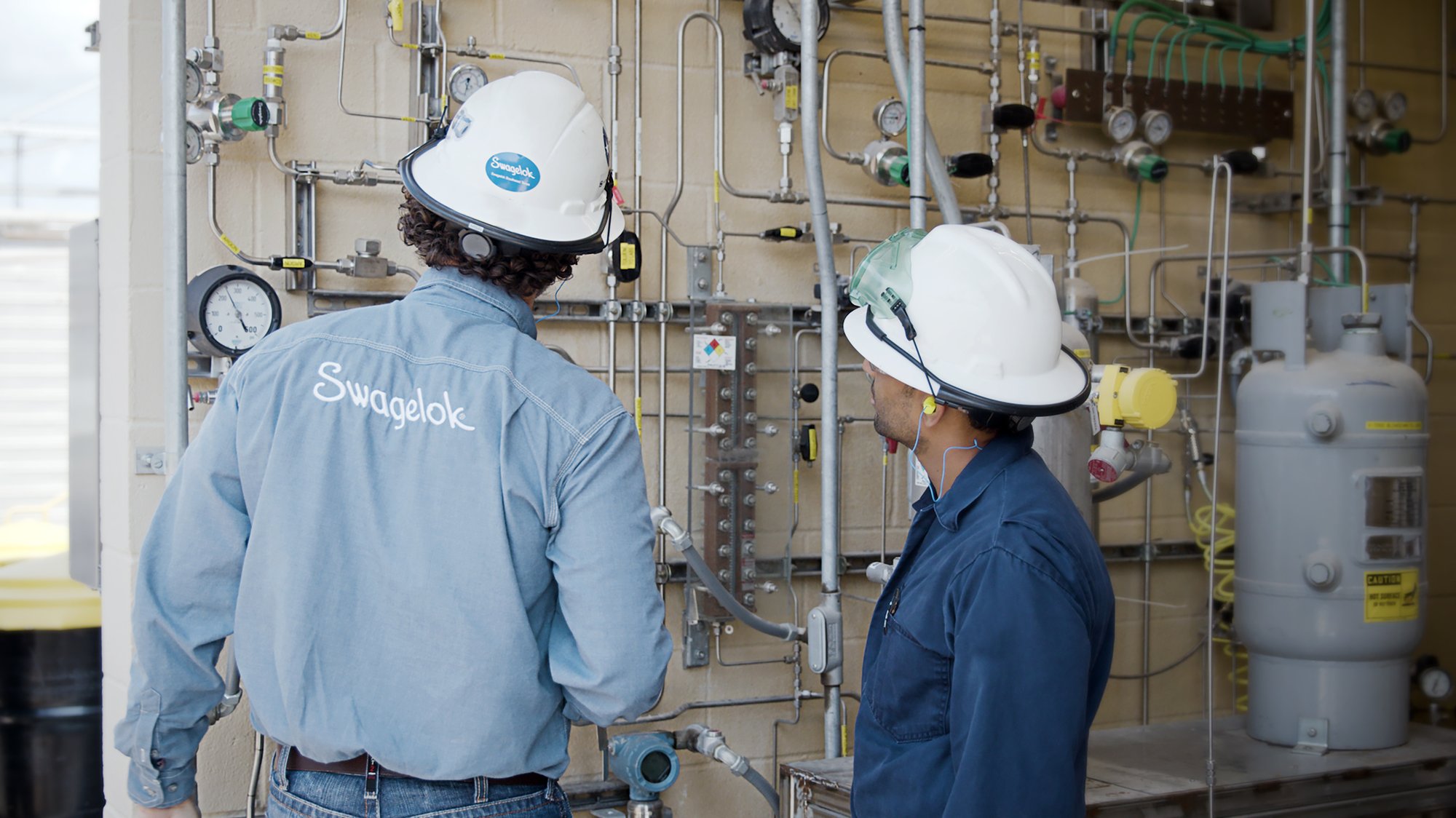 Two field engineers working on site Two field engineers working on site